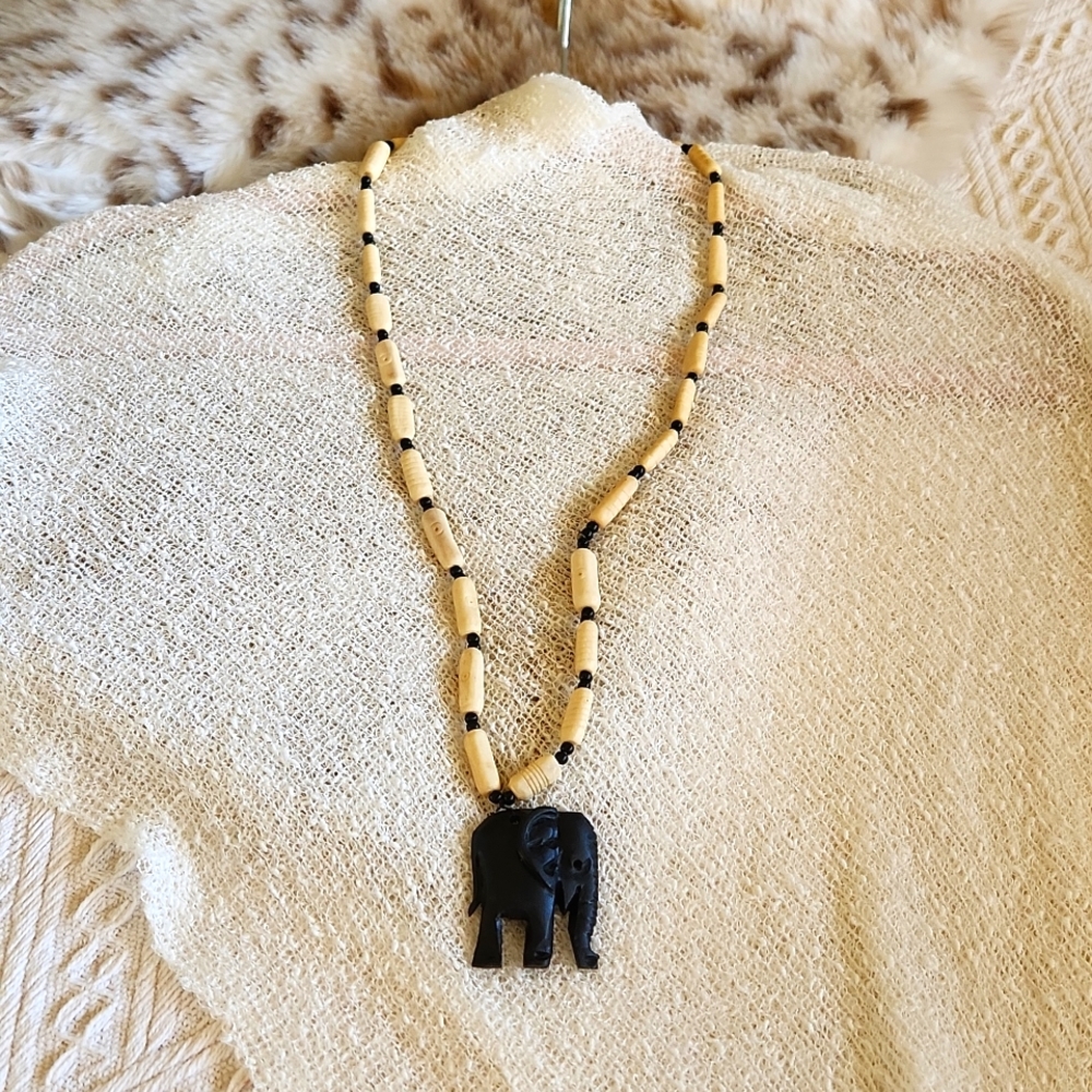Ebony and Ivory 14 " elaphant necklase.